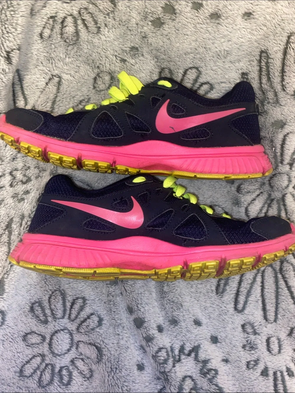 Nike women’s Navy Sneakers with Neon Green Laces and Pink Accents